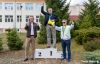 Biegacze stoją na podium